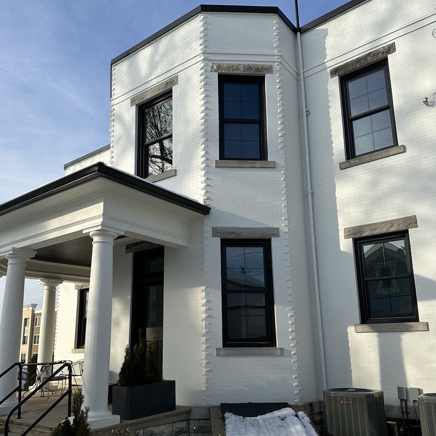 Same house exterior after a professional repaint by Turner Painting