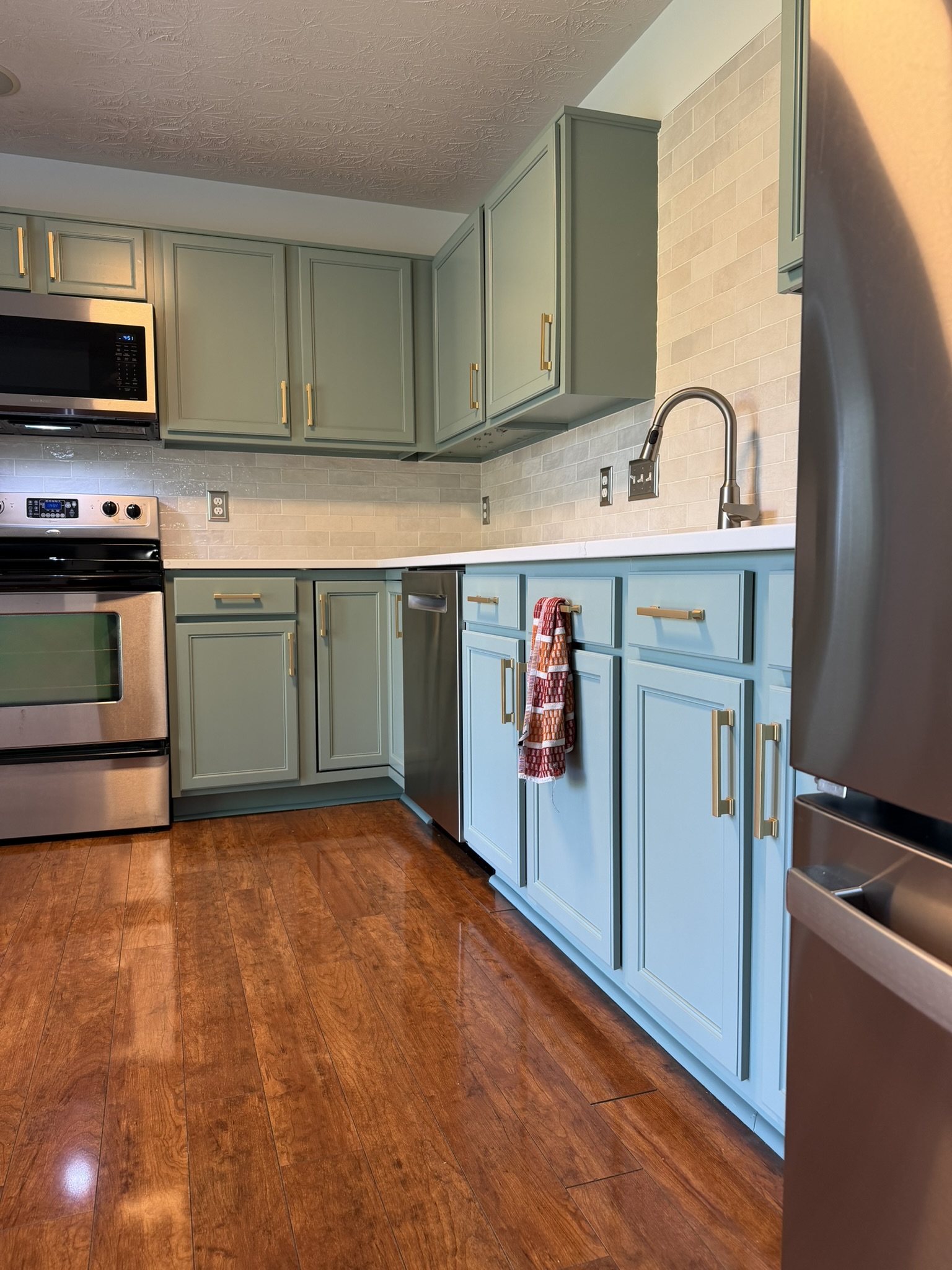 Refinished kitchen cabinets painted by Turner Painting near Monroe, Ohio