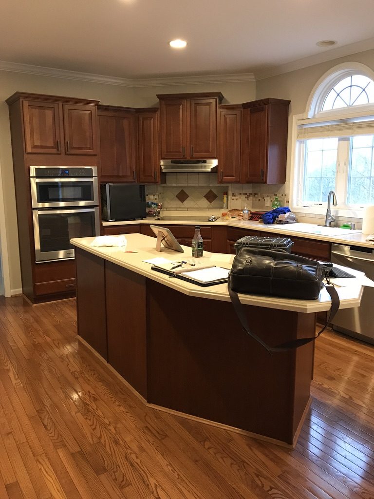 Cherry stained kitchen cabinets in Monroe, OH before cabinet painting